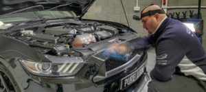 person cleaning car auto detailing car valeting at Pure Look Auto Detailing