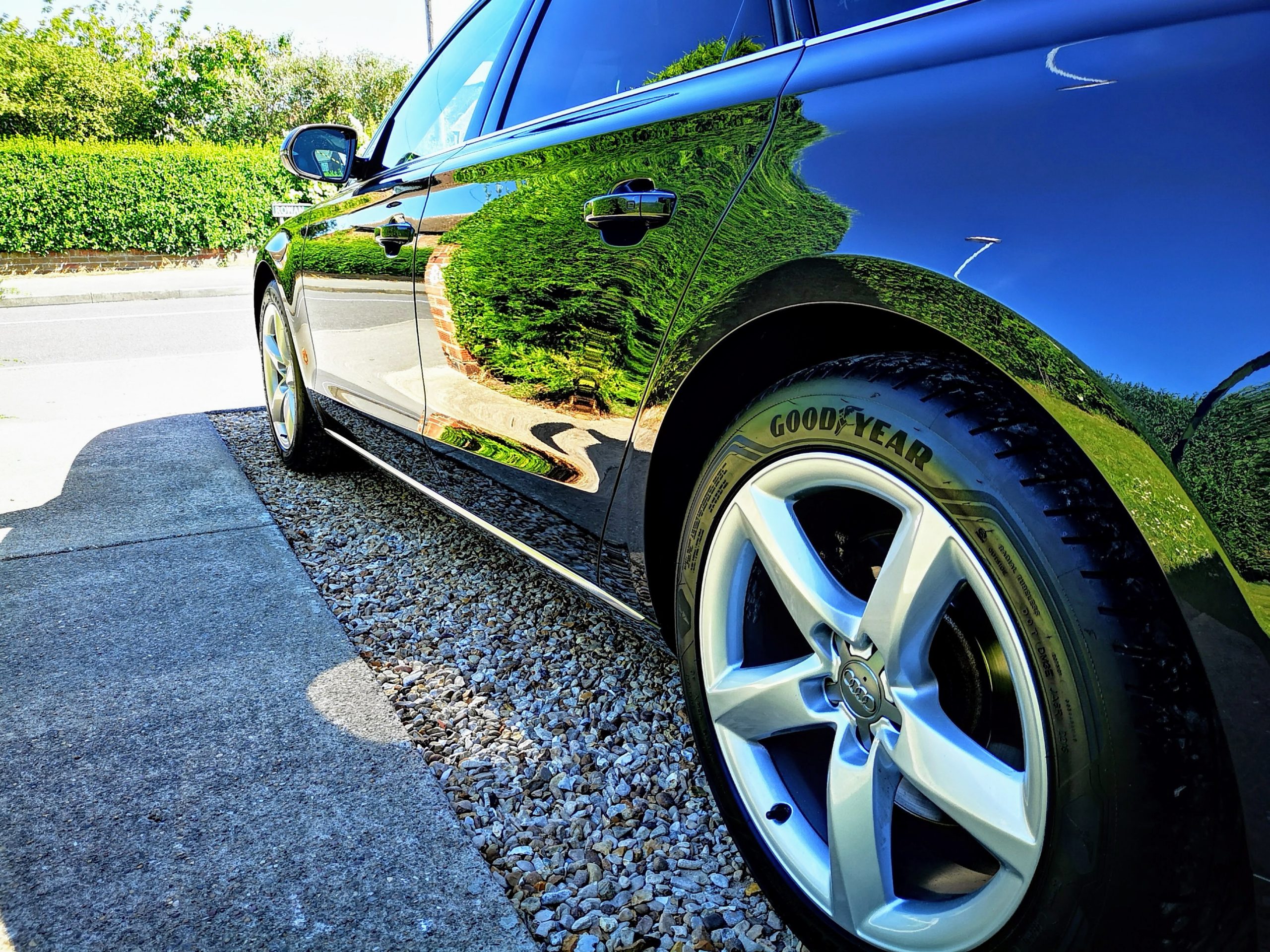 mirror effect on car side paint correction caramic coating paint protection auto detailing Pure Look Auto Detailing