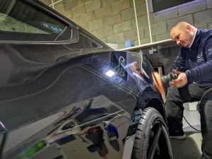 person polishing car ford mustang paint correction auto detailing car valeting